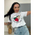 Biele tričko s flitrovým zdobením a potlačou STRAWBERRY 